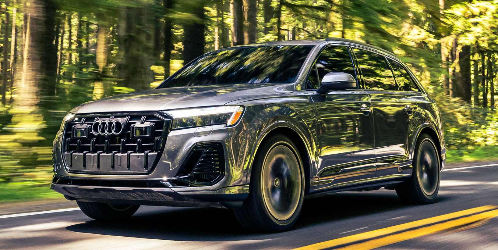 New Q7 driving through forest